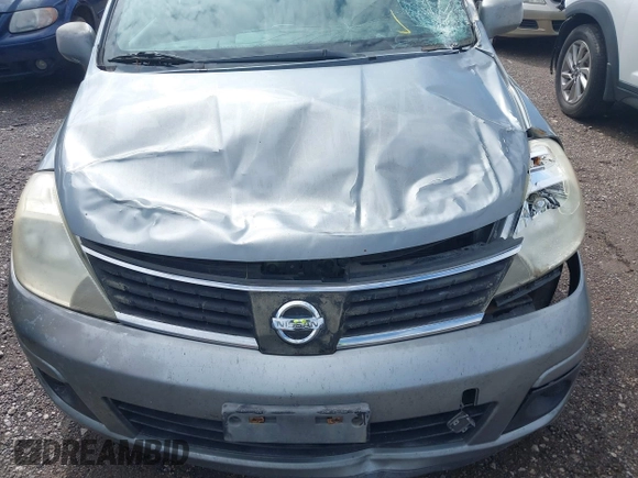 2007 Nissan Versa 1.8 S with VIN 3N1BC13E77L443629, listed as a IAAI auction lot 41745060 with 150,653 mi miles. Bid and sale history available at carsss.com. Image 6.