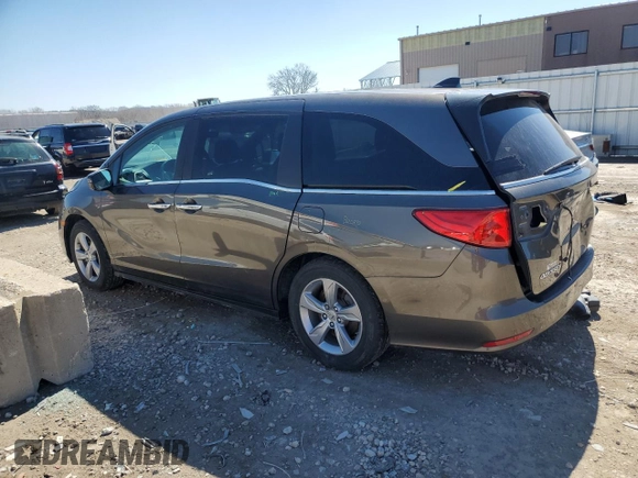 2018 Honda Odyssey EX-L with VIN 5FNRL6H78JB069850, listed as a Copart auction lot 49771875 with 103,914 mi miles and Salvage Title. Bid and sale history available at DreamBid. Image 2.
