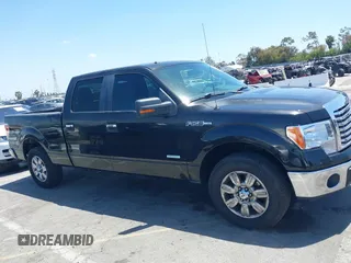 2012 Ford F-150 XL z VIN 1FTFW1CT5CFB34590, wystawiony jako IAAI lot #42279514 z przebiegiem 196 480 mil mil oraz . Historia ofert i sprzedaży dostępna na DreamBid. Obrazek 13.