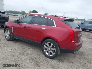 2012 Cadillac SRX Performance Collection with VIN 3GYFNBE36CS527333, listed as a IAAI auction lot 41910224 with 144,446 mi miles. Bid and sale history available at carsss.com. Image 3.