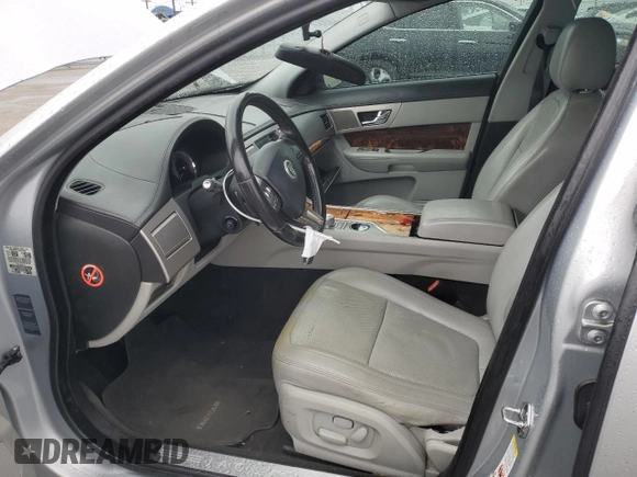 2009 Jaguar XF Premium Luxury with VIN SAJWA06B69HR43610, listed as a Copart auction lot 47394115 with 173,426 mi miles and Salvage Title. Bid and sale history available at DreamBid. Image 7.