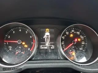 2016 Volkswagen Passat 1.8T SE with VIN 1VWBT7A34GC030092, listed as a Copart auction lot 71264114 with 131,798 mi miles and Salvage Title. Bid and sale history available at carsss.com. Image 9.
