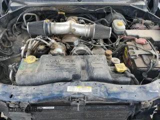 2002 Dodge Durango SLT z VIN 1B4HS48N52F176866, wystawiony jako Copart lot #80549804 z przebiegiem 216 558 mil mil oraz Czysty tytuł • Clean title. Historia ofert i sprzedaży dostępna na DreamBid. Obrazek 13.