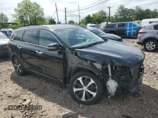 2017 Kia Sorento EX with VIN 5XYPHDA55HG201570, listed as a Copart auction lot 57595985 with 129,698 mi miles and Salvage title. Bid and sale history available at DreamBid. Image 4.