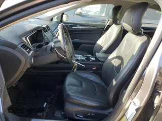 2014 Ford Fusion Titanium с VIN 3FA6P0K91ER218320, выставлен на аукционе Copart как лот 41871285 с пробегом 80 151 миль миль и На запчасти • Non repairable. История ставок и продаж доступна на DreamBid. Изображение 7.