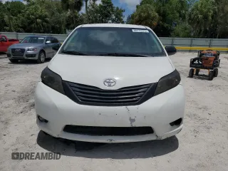 2014 Toyota Sienna L with VIN 5TDZK3DC3ES430634, listed as a Copart auction lot 60715375 with 122,621 mi miles and Salvage title. Bid and sale history available at DreamBid. Image 5.