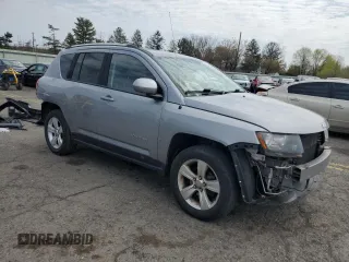 2014 Jeep Compass Latitude with VIN 1C4NJDEB4ED788348, listed as a Copart auction lot 52885935 with 86,282 mi miles and Salvage Title. Bid and sale history available at DreamBid. Image 4.