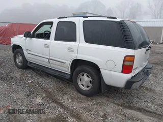 2003 GMC Yukon SLT with VIN 1GKEC13Z33R175358, listed as a IAAI auction lot 41801299 with 269,167 mi miles. Bid and sale history available at carsss.com. Image 3.