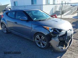 2017 Hyundai Veloster with VIN KMHTC6AD9HU323472, listed as a IAAI auction lot 41865974 with 94,692 mi miles. Bid and sale history available at carsss.com. Image 1.