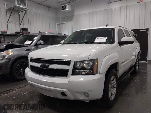 2007 Chevrolet Suburban LT with VIN 1GNFK16307J240138, listed as a IAAI auction lot 42039221 with 212,689 mi miles and . Bid and sale history available at DreamBid. Image 6.