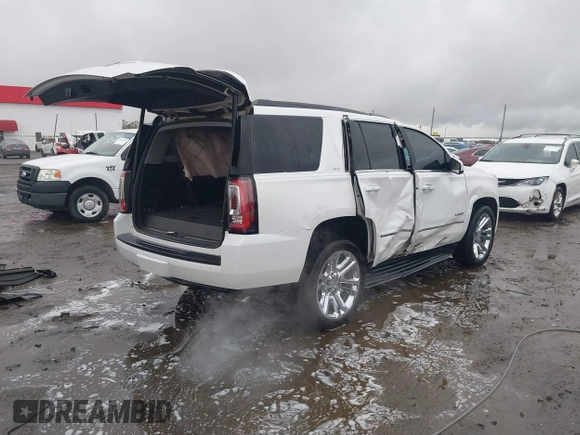 2018 GMC Yukon SLT with VIN 1GKS1BKC8JR392851, listed as a IAAI auction lot 40744741 with 117,028 mi miles. Bid and sale history available at carsss.com. Image 4.