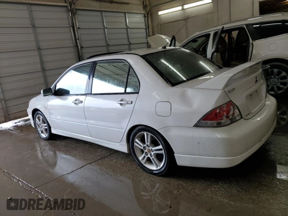 2004 Mitsubishi Lancer with VIN JA3AJ66F64U029144, listed as a Copart auction lot 77437234 with 158,049 mi miles and Salvage Title. Bid and sale history available at DreamBid. Image 2.