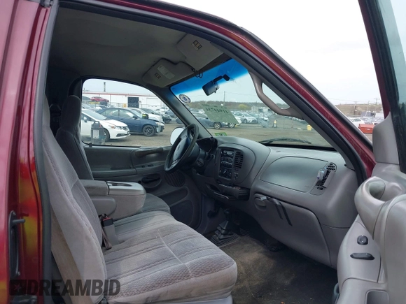 1998 Ford F-150 XL with VIN 1FTDX18W9WKA01690, listed as a IAAI auction lot 41944734 with 176,359 mi miles. Bid and sale history available at carsss.com. Image 5.