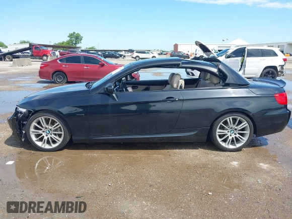 2013 BMW 3 Series 335i with VIN WBADX7C52DJ589384, listed as a IAAI auction lot 42453370 with 58,821 mi miles and . Bid and sale history available at DreamBid. Image 14.