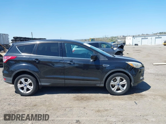 2015 Ford Escape SE with VIN 1FMCU9GX3FUC14020, listed as a IAAI auction lot 42069921 with 111,113 mi miles. Bid and sale history available at carsss.com. Image 6.