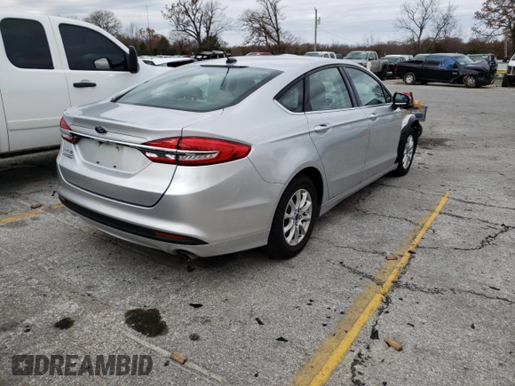 2017 Ford Fusion S with VIN 3FA6P0G77HR273995, listed as a Copart auction lot 82822813 with 113,568 mi miles and Non Repairable. Bid and sale history available at DreamBid. Image 4.