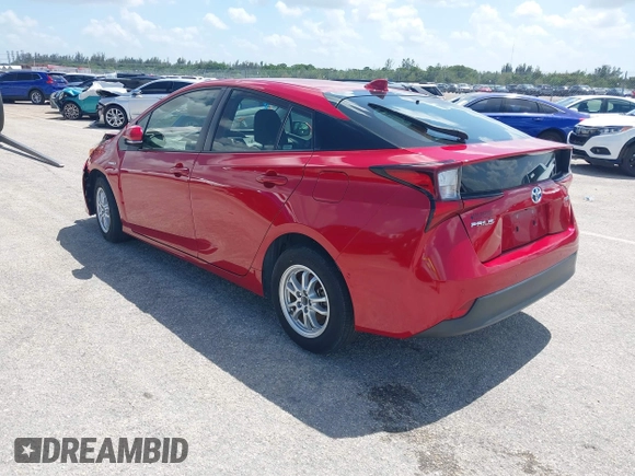 2021 Toyota Prius L Eco with VIN JTDKAMFU4M3145215, listed as a IAAI auction lot 42281566 with 74,220 mi miles and . Bid and sale history available at DreamBid. Image 3.