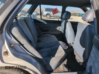 1993 Ford Escort z VIN 1FAPP15J7PW181838, wystawiony jako Copart lot #88717755 z przebiegiem 6 017 mil mil oraz Szkoda całkowita • Salvage title. Historia ofert i sprzedaży dostępna na DreamBid. Obrazek 10.