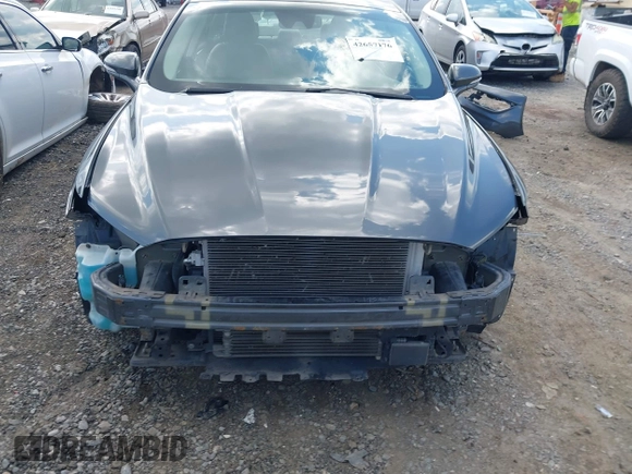 2017 Ford Fusion Hybrid SE z VIN 3FA6P0LU3HR260558, wystawiony jako IAAI lot #42657176 z przebiegiem 161 183 mil mil oraz . Historia ofert i sprzedaży dostępna na DreamBid. Obrazek 13.