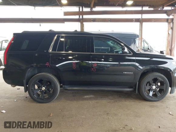 2015 Chevrolet Tahoe LT with VIN 1GNSKBKCXFR604401, listed as a IAAI auction lot 42048559 with 60,768 mi miles and . Bid and sale history available at DreamBid. Image 13.
