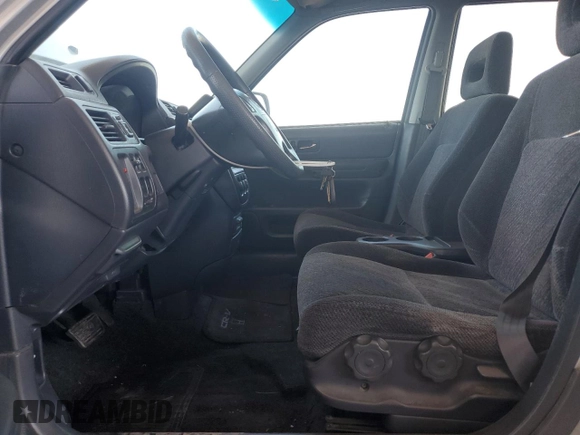 2000 Honda CR-V EX z VIN JHLRD1863YC049913, wystawiony jako Copart lot #57705385 z przebiegiem 269 412 mil mil oraz Szkoda całkowita • Salvage title. Historia ofert i sprzedaży dostępna na DreamBid. Obrazek 7.