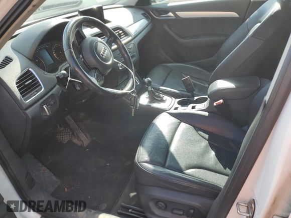 2015 Audi Q3 with VIN WA1EFEFS5FR009981, listed as a Copart auction lot 73714854 with 157,693 mi miles and Salvage title. Bid and sale history available at DreamBid. Image 7.