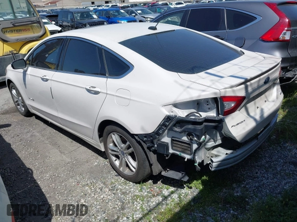 2016 Ford Fusion Titanium Hybrid with VIN 3FA6P0RU1GR259947, listed as a IAAI auction lot 41695377 with 97,605 mi miles. Bid and sale history available at carsss.com. Image 3.