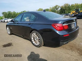 2015 BMW 7 Series 750i xDrive with VIN WBAYB6C53FD966042, listed as a Copart auction lot 69387464 with 64,977 mi miles and Salvage Title. Bid and sale history available at carsss.com. Image 2.