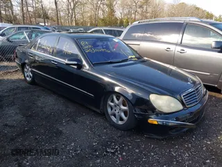 2004 Mercedes-Benz S-Class 5.0L with VIN WDBNG84J44A427425, listed as a IAAI auction lot 41851176 with 999,999 mi miles. Bid and sale history available at carsss.com. Image 1.