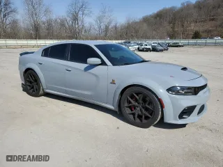 2020 Dodge Charger Scat Pack with VIN 2C3CDXGJ2LH232208, listed as a Copart auction lot 48927195 with 52,759 mi miles and Salvage Title. Bid and sale history available at carsss.com. Image 4.