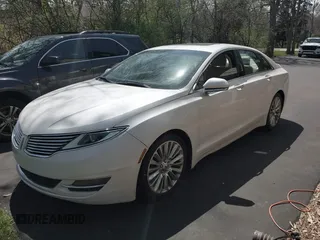 2014 Lincoln MKZ with VIN 3LN6L2G95ER827769, listed as a IAAI auction lot 42109075 with 154,000 mi miles. Bid and sale history available at carsss.com. Image 2.