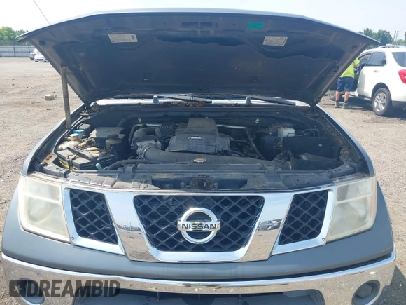 2005 Nissan Frontier LE with VIN 1N6AD07W35C438405, listed as a IAAI auction lot 42469804 with 128,472 mi miles and . Bid and sale history available at DreamBid. Image 10.