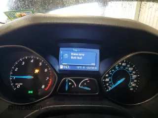 2012 Ford Focus SE z VIN 1FAHP3K24CL407570, wystawiony jako Copart lot #56002135 z przebiegiem 122 730 mil mil oraz Szkoda całkowita • Salvage title. Historia ofert i sprzedaży dostępna na DreamBid. Obrazek 9.