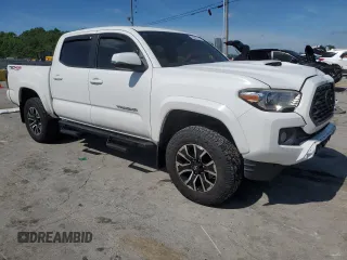 2020 Toyota Tacoma SR5 with VIN 3TMCZ5AN9LM296891, listed as a Copart auction lot 56047625 with 74,301 mi miles and Salvage title. Bid and sale history available at DreamBid. Image 4.