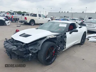 2015 Chevrolet Corvette Z51 3LT with VIN 1G1YL2D76F5112867, listed as a IAAI auction lot 39194815 with 64,225 mi miles. Bid and sale history available at carsss.com. Image 2.