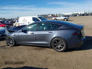 2023 Tesla Model S with VIN 5YJSA1E5XPF500341, listed as a IAAI auction lot 40756406 with 11,583 mi miles and . Bid and sale history available at DreamBid. Image 15.