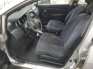 2009 Nissan Versa 1.6 with VIN 3N1CC11E49L422408, listed as a Copart auction lot 55093745 with 169,189 mi miles and Salvage title. Bid and sale history available at DreamBid. Image 7.