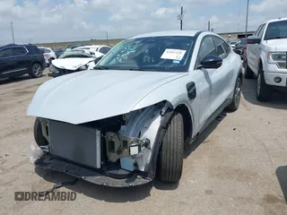 2023 Ford Mustang Mach-E Select z VIN 3FMTK1R40PMA76405, wystawiony jako IAAI lot #42167231 z przebiegiem 16 927 mil mil oraz . Historia ofert i sprzedaży dostępna na DreamBid. Obrazek 16.
