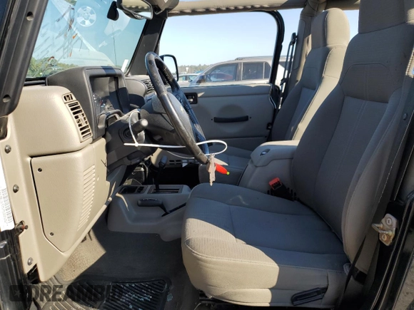 2004 Jeep Wrangler Sahara with VIN 1J4FA59S04P772756, listed as a Copart auction lot 47973495 with 92,685 mi miles and Salvage Title. Bid and sale history available at DreamBid. Image 7.