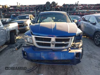 2010 Dodge Dakota Bighorn/Lonestar with VIN 1D7CW3GP5AS130870, listed as a IAAI auction lot 40929651 with 128,077 mi miles. Bid and sale history available at carsss.com. Image 11.
