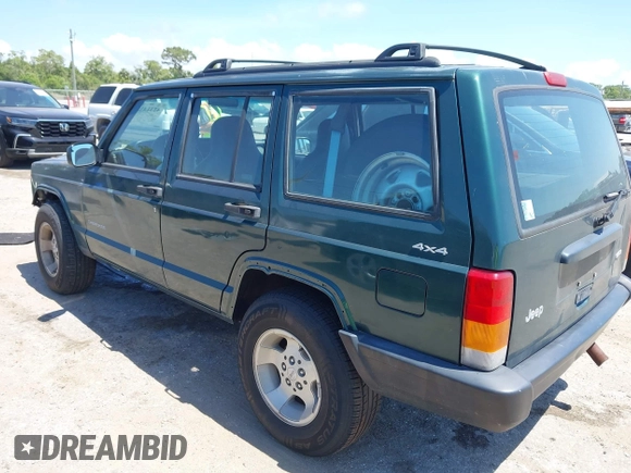 2000 Jeep Cherokee SE with VIN 1J4FF28S0YL236369, listed as a IAAI auction lot 42314386 with 159,005 mi miles and . Bid and sale history available at DreamBid. Image 3.
