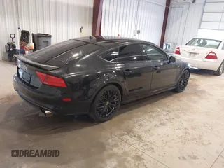 2015 Audi S7 with VIN WAUW2AFC0FN015327, listed as a IAAI auction lot 41964788 with 145,953 mi miles. Bid and sale history available at carsss.com. Image 4.