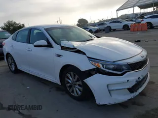 2016 Kia Optima LX z VIN 5XXGT4L34GG084299, wystawiony jako IAAI lot #39779795 z przebiegiem 237 126 mil mil oraz . Historia ofert i sprzedaży dostępna na DreamBid. Obrazek 1.