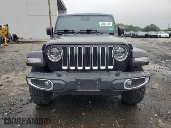 2019 Jeep Wrangler Unlimited Sahara z VIN 1C4HJXEN7KW612273, wystawiony jako Copart lot #60744185 z przebiegiem 55 176 mil mil oraz Szkoda całkowita • Salvage title. Historia ofert i sprzedaży dostępna na DreamBid. Obrazek 5.