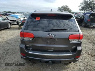 2021 Jeep Grand Cherokee Overland with VIN 1C4RJFCG9MC620320, listed as a Copart auction lot 85609814 with 61,335 mi miles and Salvage title. Bid and sale history available at DreamBid. Image 6.