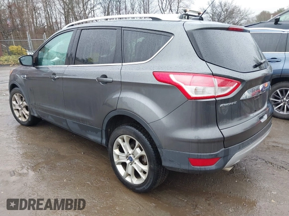 2015 Ford Escape Titanium with VIN 1FMCU9JX6FUB79093, listed as a IAAI auction lot 41805057 with 87,788 mi miles. Bid and sale history available at carsss.com. Image 3.