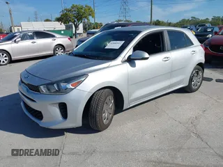 2020 Kia Rio S with VIN 3KPA25AD4LE309303, listed as a IAAI auction lot 41800912 with 75,393 mi miles and . Bid and sale history available at DreamBid. Image 2.
