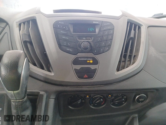 2018 Ford Transit with VIN 1FTYE1YM8JKB52177, listed as a IAAI auction lot 42564689 with 169,859 mi miles and . Bid and sale history available at DreamBid. Image 14.