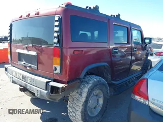 2003 Hummer H2 with VIN 5GRGN23U33H115187, listed as a IAAI auction lot 38374466 with 153,158 mi miles. Bid and sale history available at carsss.com. Image 4.