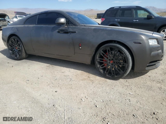 2014 Rolls-Royce Wraith with VIN SCA665C57EUX84259, listed as a Copart auction lot 65586204 with 52,048 mi miles and Salvage Title. Bid and sale history available at carsss.com. Image 4.